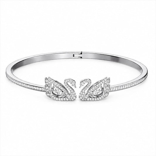 Swarovski Dancing Swan Bangle Bracelet (White Stones) – Comes in original brand packaging.