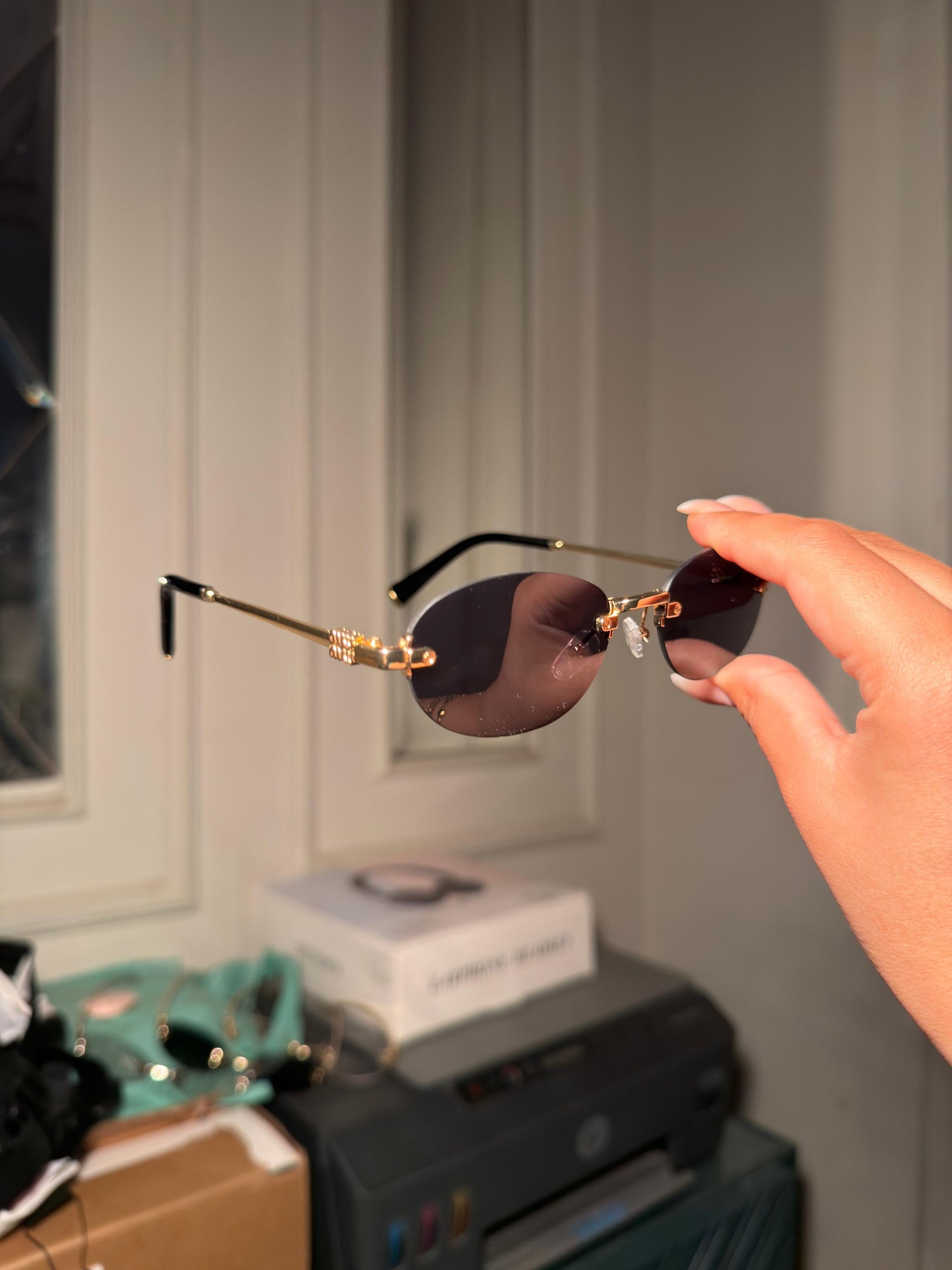 Miu Miu Rimless Oval Sunglasses